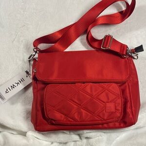 IHKWIP Red Quilted Front Pocket Crossbody Bag